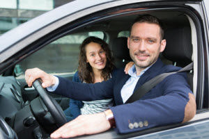 Man-and-woman-ready-to-drive-ram-dealer-dick-huvaeres-richmond-chrysler-dodge-jeep-ram-richmond-mi